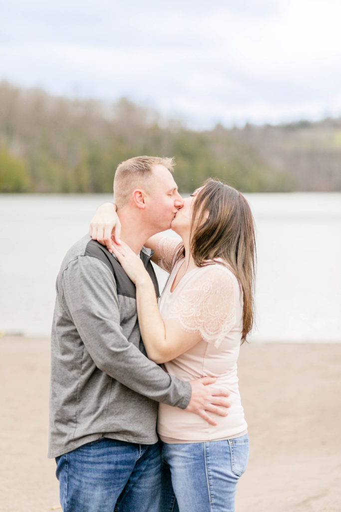 Engagement session, couple kissing at Green Lakes. 
