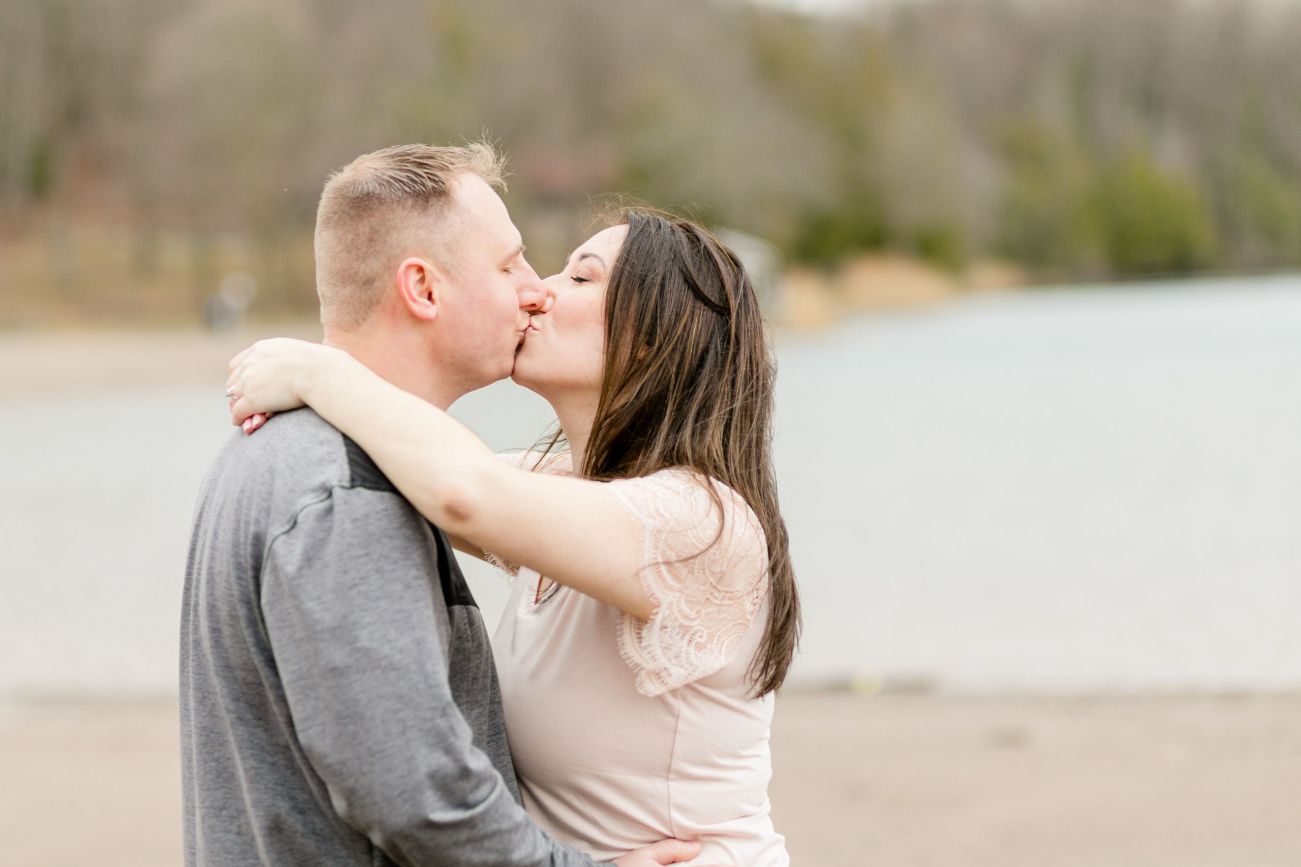 couple kissing at Green Lakes. 


