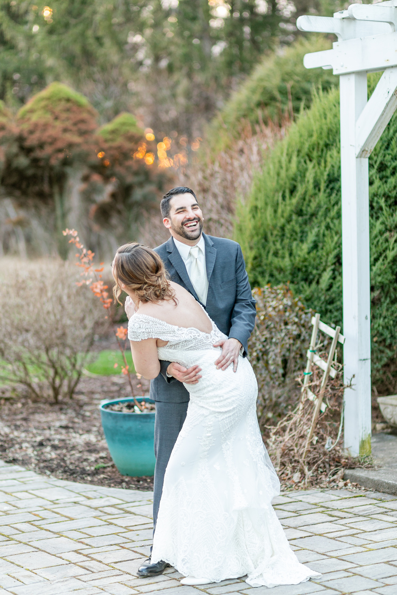 bride and groom laughing together taken by a Upstate NY Wedding Photographer