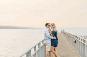 Sunrise engagement photos by the lake and charming streets in Skaneateles NY