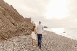 Engagement session at Chimney Bluffs State Park cliffs overlooking Lake Ontario
